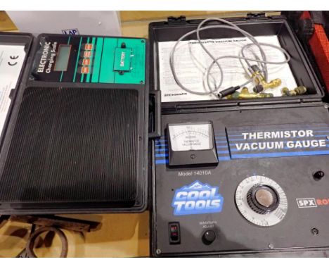 SPX Robinair USA made. thermistor vacuum gauge and an Elanmax electronic refrigerant scale. Not available for in-house P&amp;