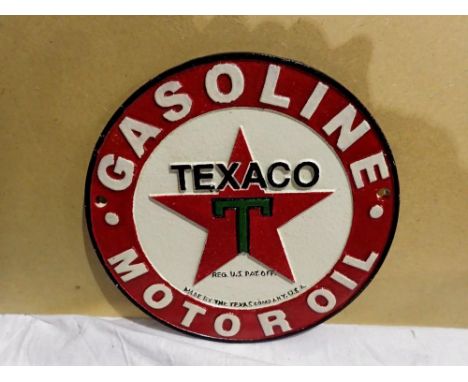 Cast iron Circular Texaco sign. D: 17 cm. UK P&amp;P Group 1 (£16+VAT for the first lot and £2+VAT for subsequent lots) 