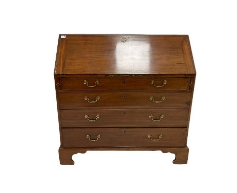 George III mahogany bureau, the fall front opening to reveal interior with drawers, cupboards and pigeon holes over four grad