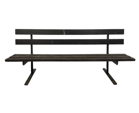 Hardwood garden bench, the slat back and seat supported by steel frame 