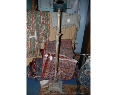 A painted brass Victorian Corinthian Standard Lamp with square base and paw feet.