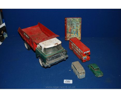 A Triang Truck, tin plate bus and money box, Dinky Van and Morris Oxford.