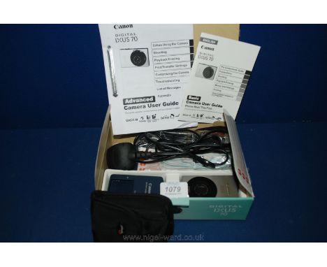 A Canon digital 1 XUS70 Camera with instructions, case and leads, etc.