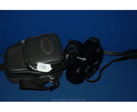 A Olympus IS 1000 Japanese automatic Camera and Lens plus a wide angle Lens
