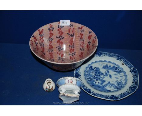 A Staffordshire pottery Bowl in pink symmetrical design, blue and white octagonal oriental Plate with hairline crack, floral 