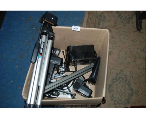 A quantity of photographic equipment including Yashica camera, Hanimex flash, Starblitz flash, tripod stands etc.