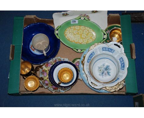 A quantity of china including four Wedgwood embossed plates, two Aynsley dishes, Royal Worcester pin dishes, blue and gilt cu