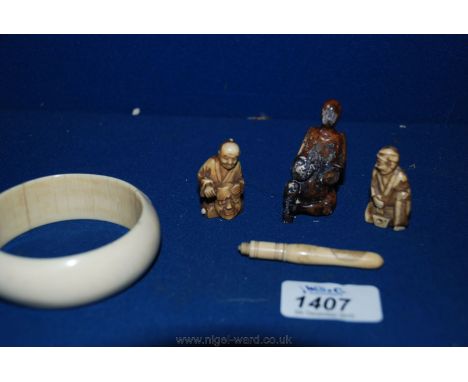 An ivory Bangle (as found), two / three ivory oriental figures and an ivory cased pencil