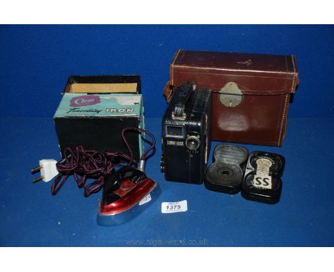 A boxed Clem Travelling iron, along with a leather cased Pathe camera