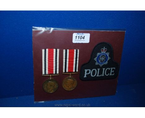 Two Special Constables faithful service Medals, one GV, the other GVI, both named, with a modern cloth 'Sussex Police' sweate
