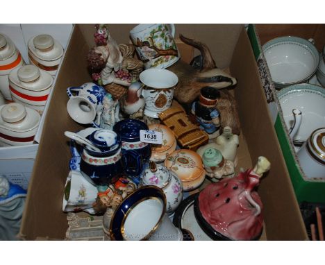 A quantity of china including badger and otter by Purbeck, Hummel figure, a/f, St. Paul's ornament, etc.