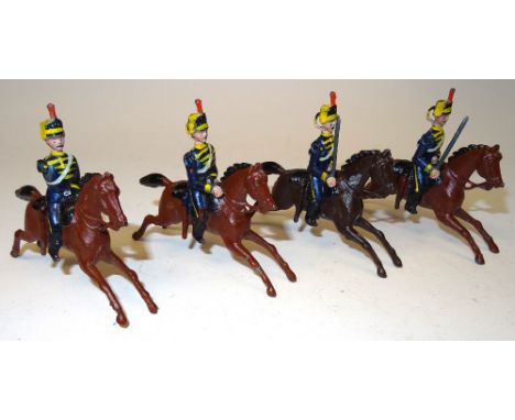 Britains set 8, 4th Hussars FIRST VERSION, rocking horse, with trumpeter (Condition Good, one trooper, trumpet arm and one sw