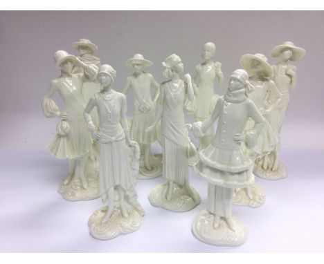 Nine Royal Worcester figures of ladies from the Vogue Collection. Shipping category D.