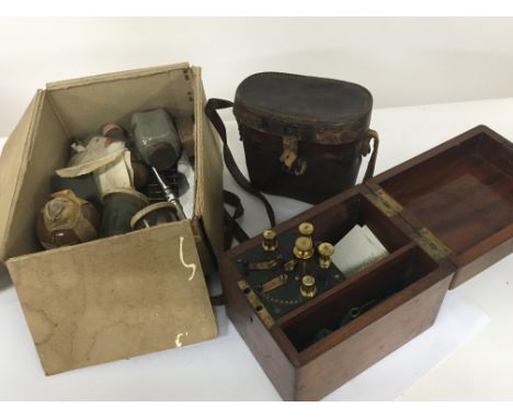 A Victorian Mahogany cased electric shock machine a Vintage pair of binoculars and a quantity of vintage dentistry instrument