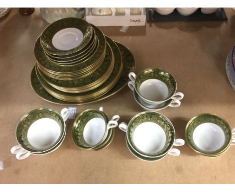 A Wedgwood Florentine set including plates and cups, no obvious damage or restoration postage category D