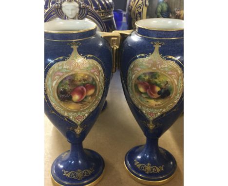 A pair of Royal Worcester vases decorated with fruit 16 cm ..