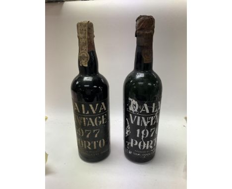 A vintage dalva 1977 port and a half bottle 1970, low level.
