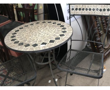 A mosaic marble and metal garden table and two matching chairs