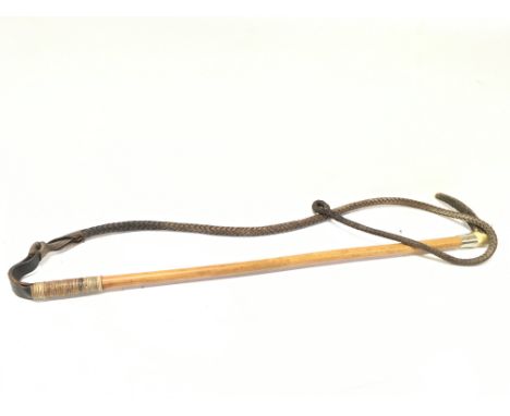 An Ashford Malacca hunting whip dated 1893, approximately 71cm long. Postage category D- NO RESERVE