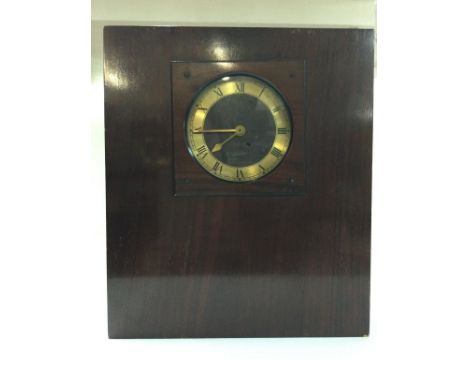 A rectangular wooden mantle clock , dimensions 30x36cm postage category D- NO RESERVE