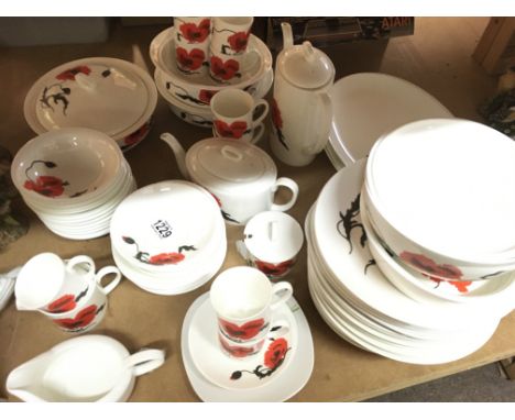 A Wedgwood Susie Cooper Corn poppy tea and dinner set including plates, cups Etc. no obvious damage or restoration postage ca