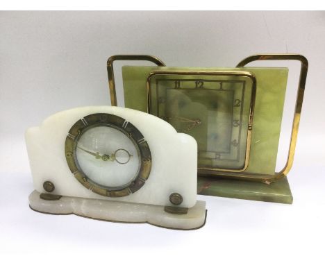 Two vintage onyx mantle clocks. Shipping category D.