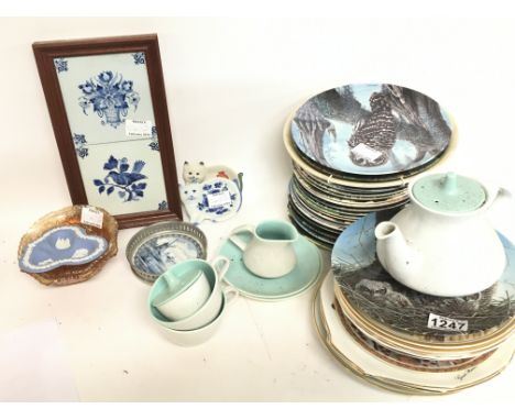 A collection of porcelain items including Poole cups and plates, Knowles owls collector plates, tiles including Royal Delft e