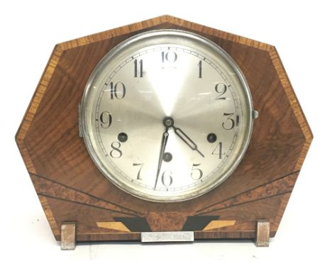 An art deco mantle clock with inlaid design, approximate dimensions 14x28x22cm. With key Seen working. Postage category D