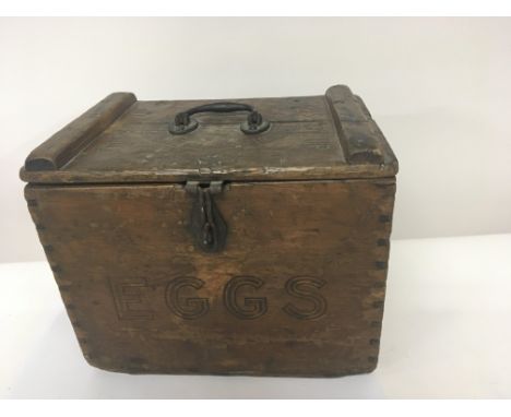 A Vintage wooden Egg box with a hinged lid and with company stamps Eggs. 33x26cm