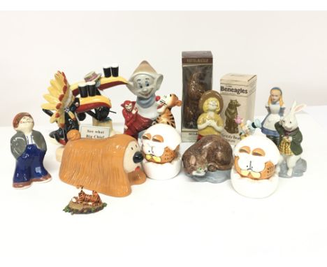 A collection of ceramic figures Royal Doulton Guinness Toucan figures a Wade Magic Roundabout Dougal and other Disney figures