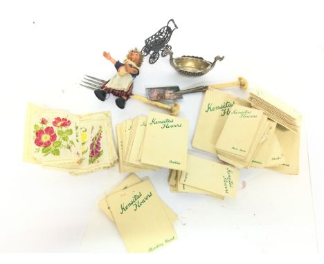 A collection of various small items including Kensitas flowers, novelty miniature plated bone handle spade and shovel, Steiff