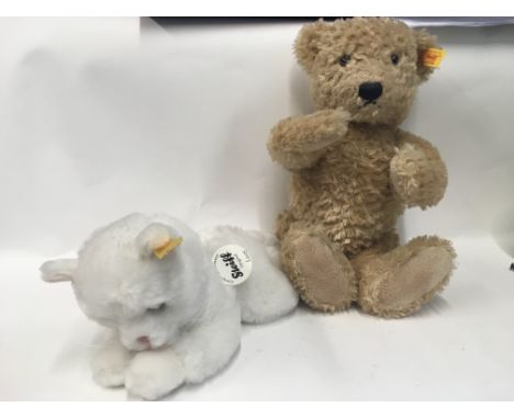 A Steiff  bear and cat and two other bears.