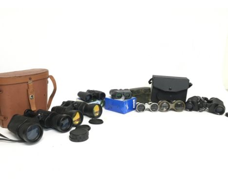 A collection of vintage binoculars, some cased including Hans Weiss 10x50, Kent 8x30 etc. Postage category D