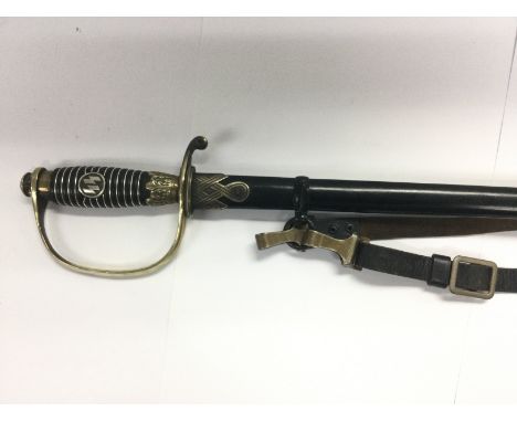A WW2 SS officer's sword with silver plated fittings and SS approved stamps and markings complete with leather strap and leat