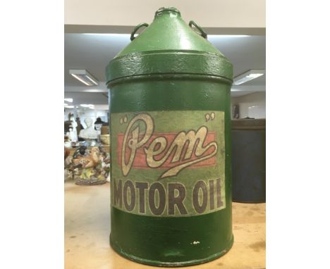 A vintage green Pem 5 gallon oil can
