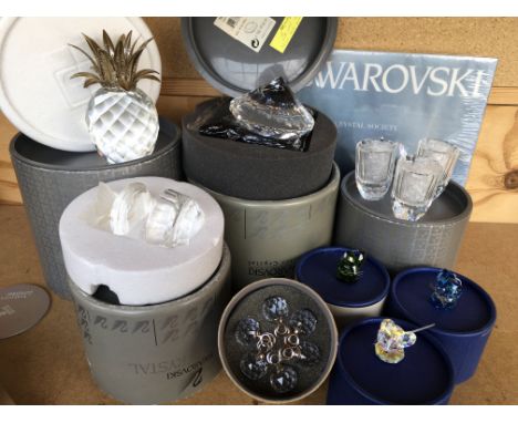 Swarovski Crystal ornaments including large pineapple with metal leaves, very large crystal in the shape of a diamond, three 