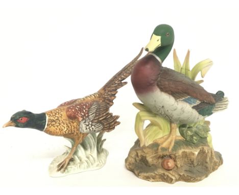 Porcelain figures including a Goebel pheasant and a Spode Malard duck figure. Approximately 14 & 17cm tall. Postage category 