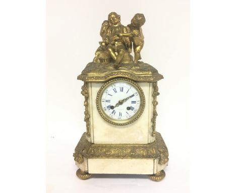 A mid 19th century French marble and ormolu clock with a mounted figure group of children and floral decoration. Dimensions a