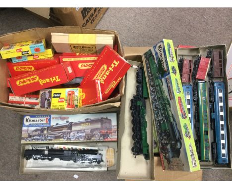 Two boxes of model trains comprising Triang and Kitmaster examples. Shipping category D.