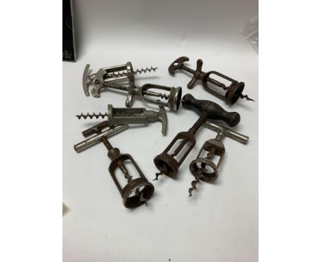 Eight vintage steel corkscrews.