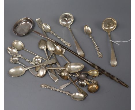 A group of small silver flatware including a Georgian toddy/cream ladle and a white metal toddy ladle with baleen handle.