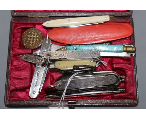 Fifteen silver, ivory, malachite and other folding penknives, including multi-function and miniature examples.