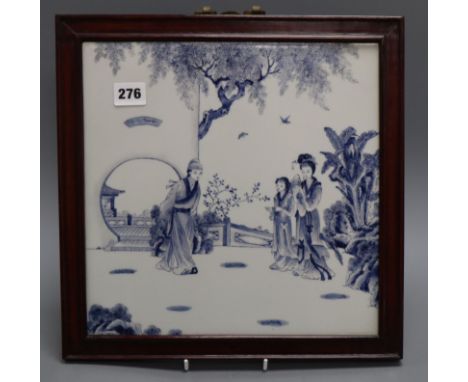 A Chinese blue and white porcelain plaque, framed 29cm squared excluding frame