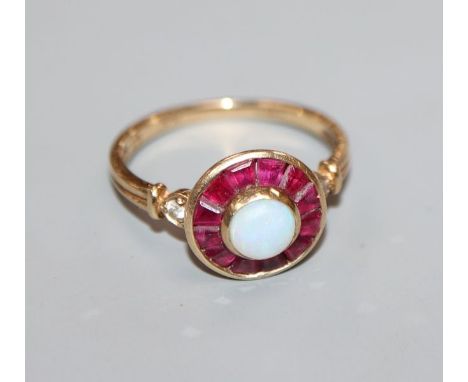 A 9ct gold, white opal and ruby cluster target ring, with diamond set shoulders, size M