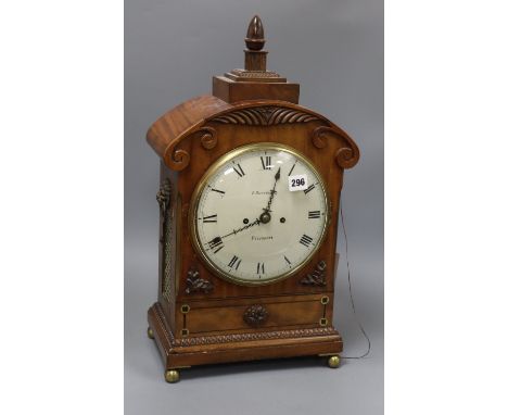 A Victorian carved mahogany mantel clock, F. Dorrington, Devonport, with double fusée repeating movement and painted Arabic d