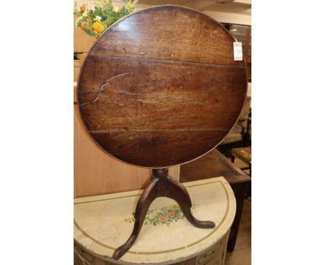 An oak tripod table W.69cm