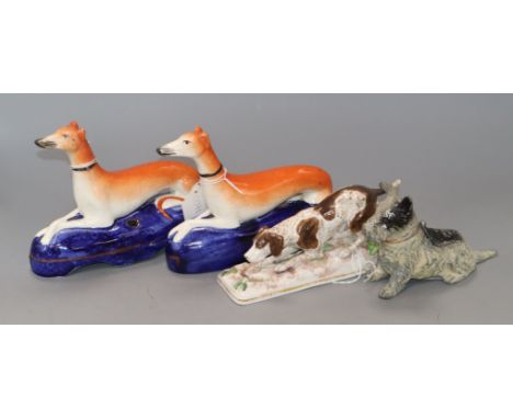 Two Staffordshire dogs, porcelain dog and metal terrier inkwell
