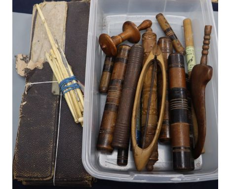 A group of 19th century ivory knitting needles, crochet sticks and treen cases