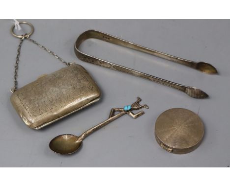 A silver purse on chain (Chester), a silver circular compact, a pair of silver sugar tongs and a turquoise-set Mexican spoon