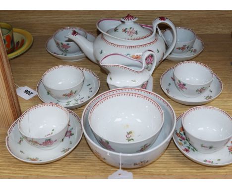 An 18th century New Hall tea service, pattern number N594, decorated with floral sprigs, comprising teapot (chip to spout), s